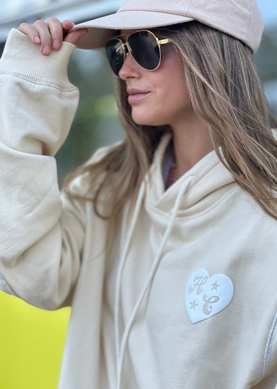 Hammill & Co Slouchy hoody with front pocket is featured in a soft unbrushed cotton with contrast white stitching around the sleeve.