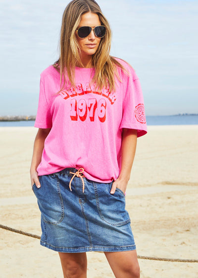 Hammill & Co Slouchy crew neck tee in a soft pink slub jersey with red retro Dreamer 1976 on the front and Hammill and Co logo on the sleeve