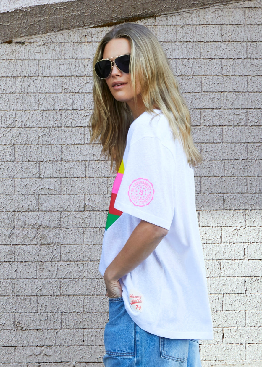Hammill & Co Oversized multi coloured heart print on our best selling V neck tee fit with small logo on the left sleeve.