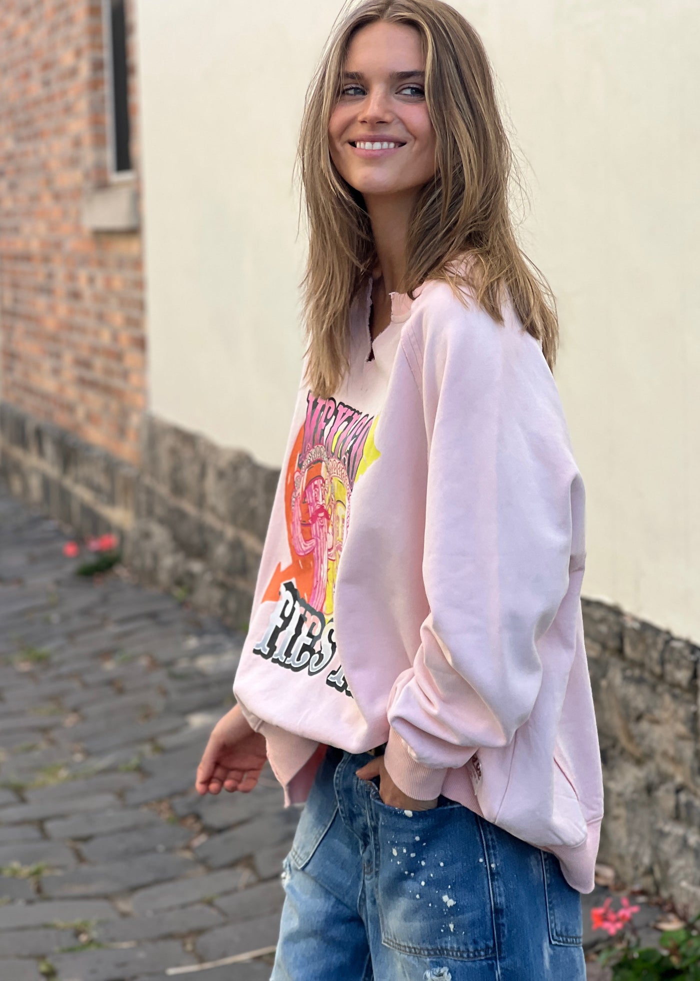 Hammill & Co oversized vintage wash sweat featuring raw cut v, exposed seams, wider rib waistband with side splits, raglan sleeve and new Mexican Fiesta print on the front and hand drawn logo on the back neck.
