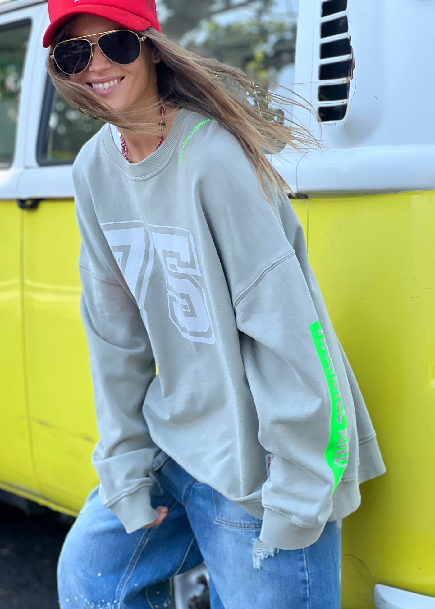 Hammill & Co longer, slouchier style sweat  in our new garment washed fleece.  Washed white 75 print on the front and neon print down the left sleeve. Pops of hot pink and neon green!
Happy vibes happy life embroidery at left side neck.  Soft 100% Washed Cotton fleece.