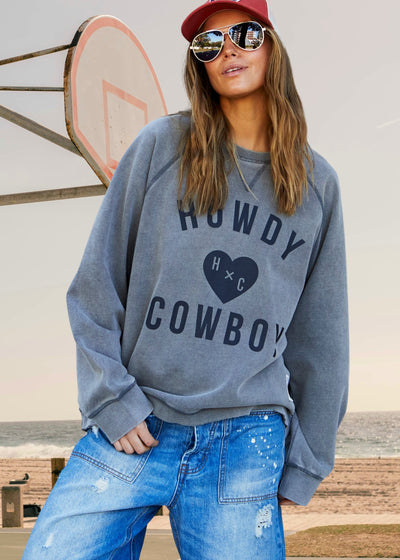 Hammill & Co wash sweats are unique, have a worn-in look and
comfortable feel. The vintage wash process involves treating the fabric to give
it a faded, slightly distressed appearance, reminiscent of well-loved garments.
Washed vintage black with black Howdy Cowboy print on the front.