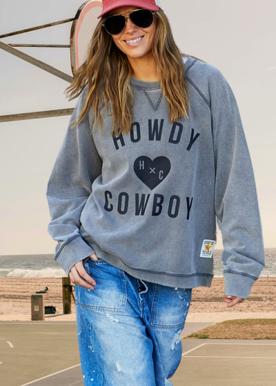 Hammill & Co wash sweats are unique, have a worn-in look and
comfortable feel. The vintage wash process involves treating the fabric to give
it a faded, slightly distressed appearance, reminiscent of well-loved garments.
Washed vintage black with black Howdy Cowboy print on the front.