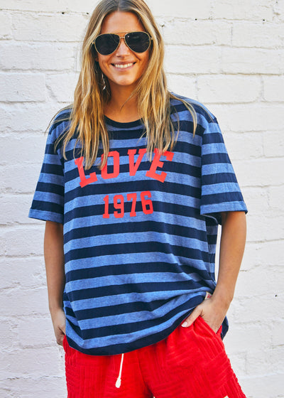 Hammill & Co bold navy and blue stripes and a pop of red“LOVE 1976” across the front.