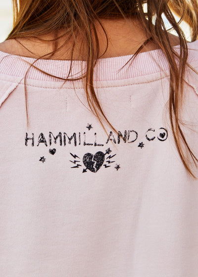 Hammill & Co oversized vintage wash sweat featuring raw cut v, exposed seams, wider rib waistband with side splits, raglan sleeve and new Mexican Fiesta print on the front and hand drawn logo on the back neck.
