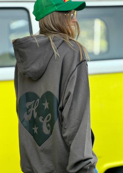 Hammill & Co Slouchy hoody with front pocket is featured in a soft unbrushed cotton with contrast white stitching around the sleeve.
Fit:Slouchy wider and longline silhouette
Features: Front kanga pocket, small puff print heart on the front left chest and larger puff print on the back featuring H&C.