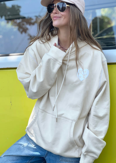 Hammill & Co Slouchy hoody with front pocket is featured in a soft unbrushed cotton with contrast white stitching around the sleeve.