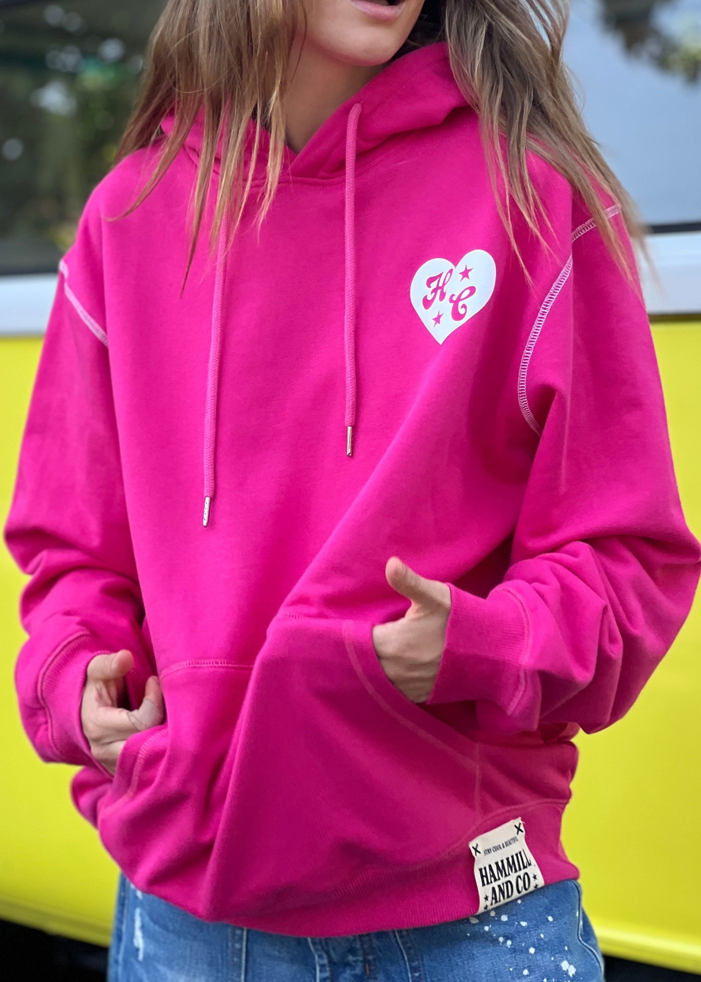 Hammill & Co Slouchy hoody with front pocket is featured in a soft unbrushed cotton with contrast white stitching around the sleeve.