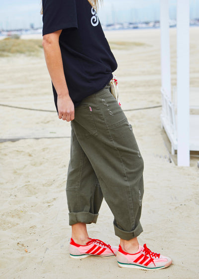Hammill & Co New summer weight stretch canvas jean in washed khaki with some subtle rips!