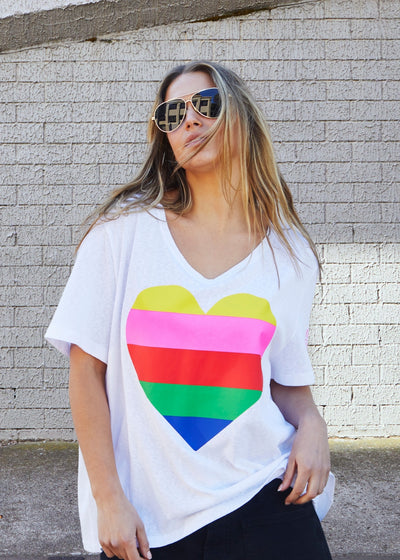 Hammill & Co Oversized multi coloured heart print on our best selling V neck tee fit with small logo on the left sleeve.