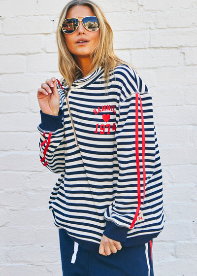 Hammill & Co Our newest sweat  features open collar with zip detail, slight drop sleeve, sporty stripes and straight raw-cut hem. This fit is relaxed, wider body but still enough length for good coverage!