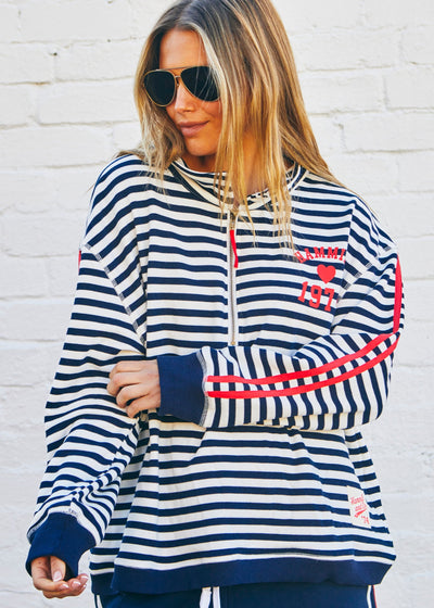 Hammill & Co Our newest sweat  features open collar with zip detail, slight drop sleeve, sporty stripes and straight raw-cut hem. This fit is relaxed, wider body but still enough length for good coverage!