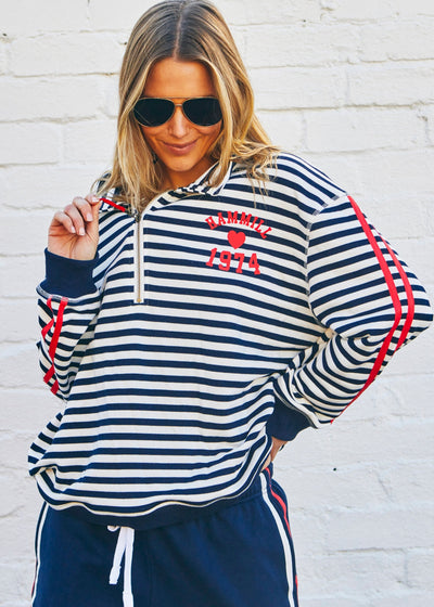 Hammill & Co Our newest sweat  features open collar with zip detail, slight drop sleeve, sporty stripes and straight raw-cut hem. This fit is relaxed, wider body but still enough length for good coverage!