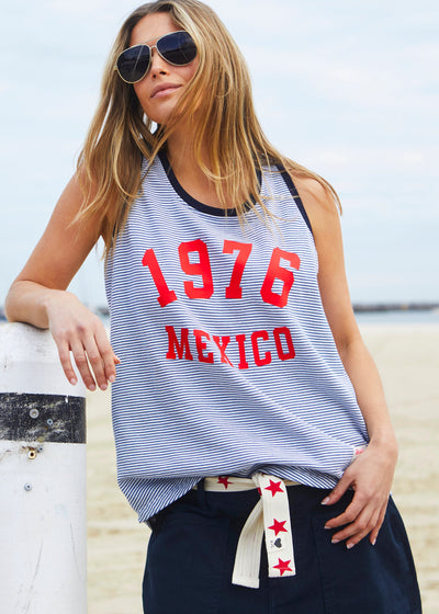 Hammill & Co Retro stripe tank in soft cotton navy and white fine stripe with navy rib. Red retro print 1976 MEXICO on the front.