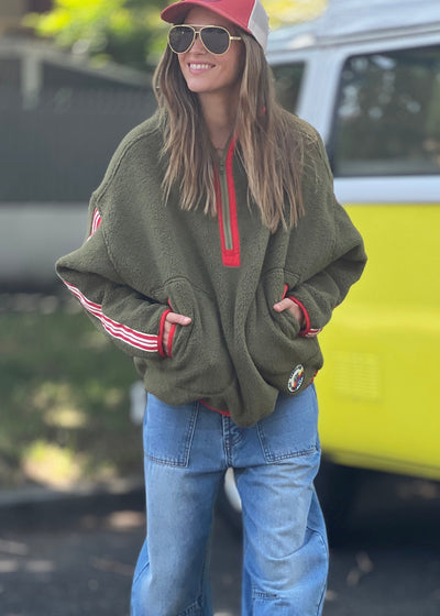 Hammill & Co Soft and cozy Khaki 1/2 zip polar fleece sweat. Featuring stripe tape down each sleeve, contrast placket and front zipper, slouchy pockets with red zips, adjustable waistband with elastic and toggle and higher neck style for extra warmth.