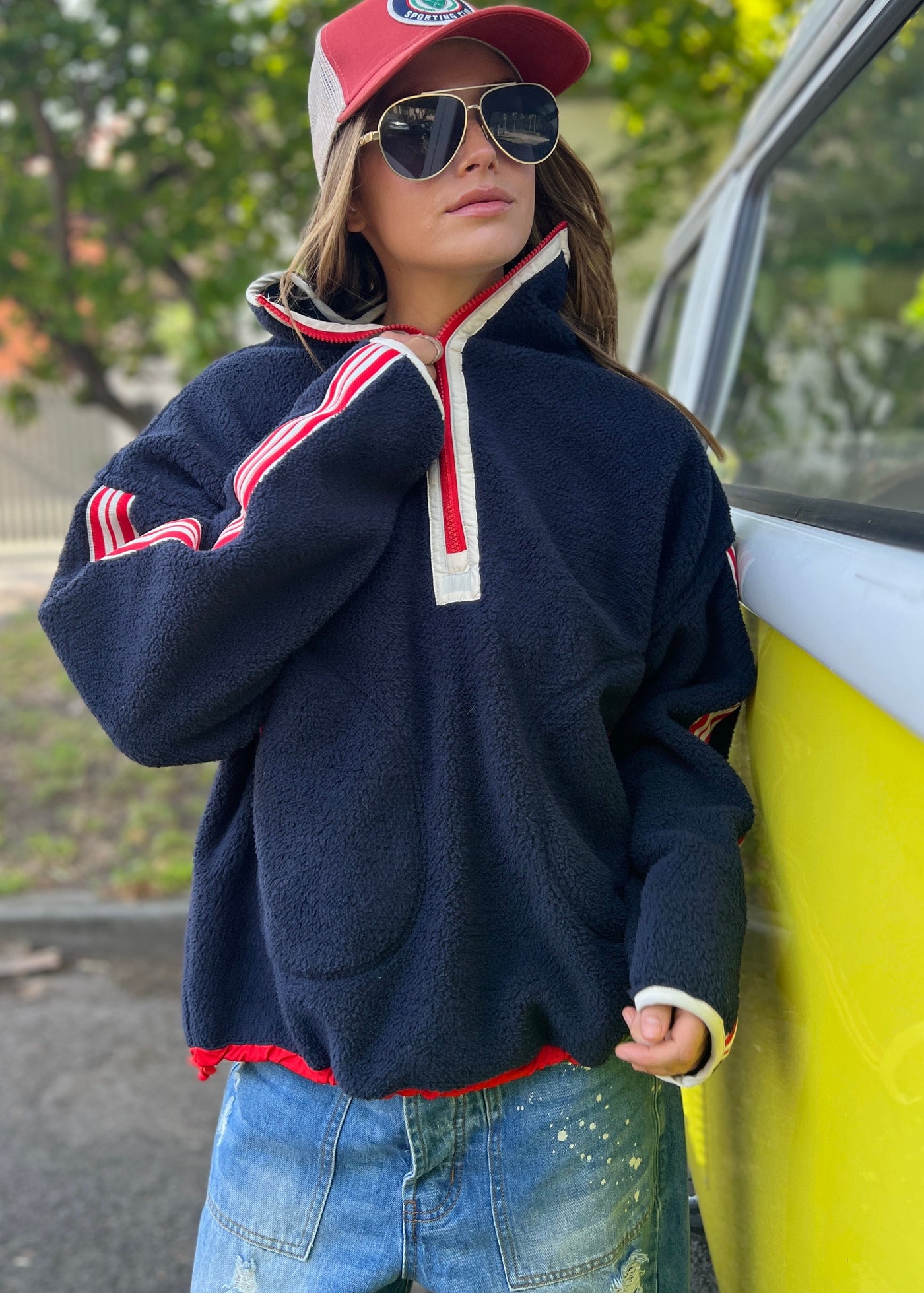 Hammill & Co Soft and cozy Navy 1/2 zip polar fleece sweat. Featuring stripe tape down each sleeve, contrast placket and front zipper, slouchy pockets with red zips, adjustable waistband with elastic and toggle and higher neck style for extra warmth.