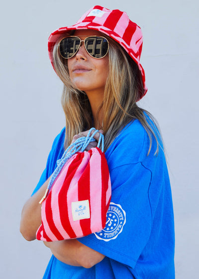 Hammill & Co adorable drawcord bag is bursting with colour and summer personality.