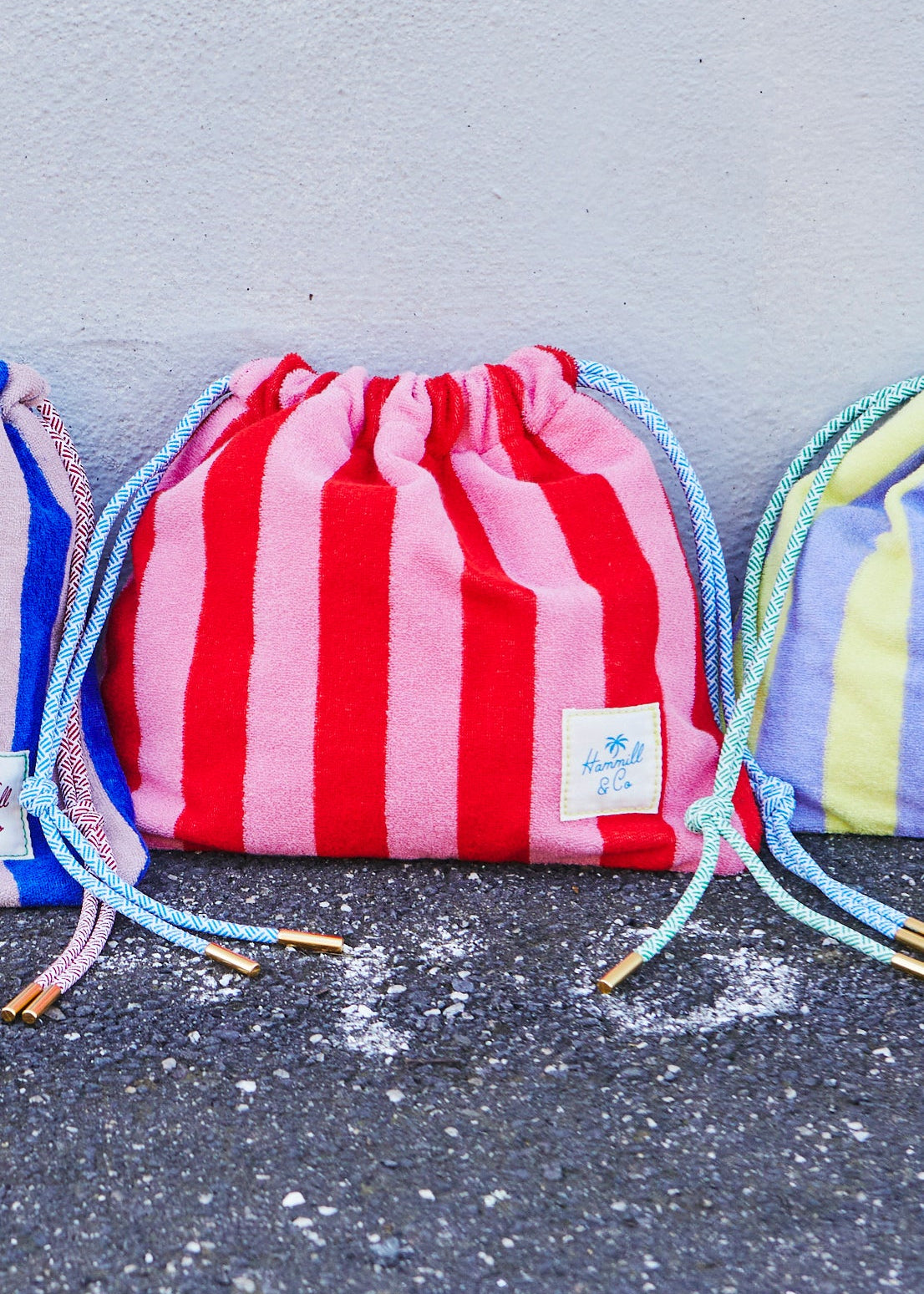 Hammill & Co adorable drawcord bag is bursting with colour and summer personality.