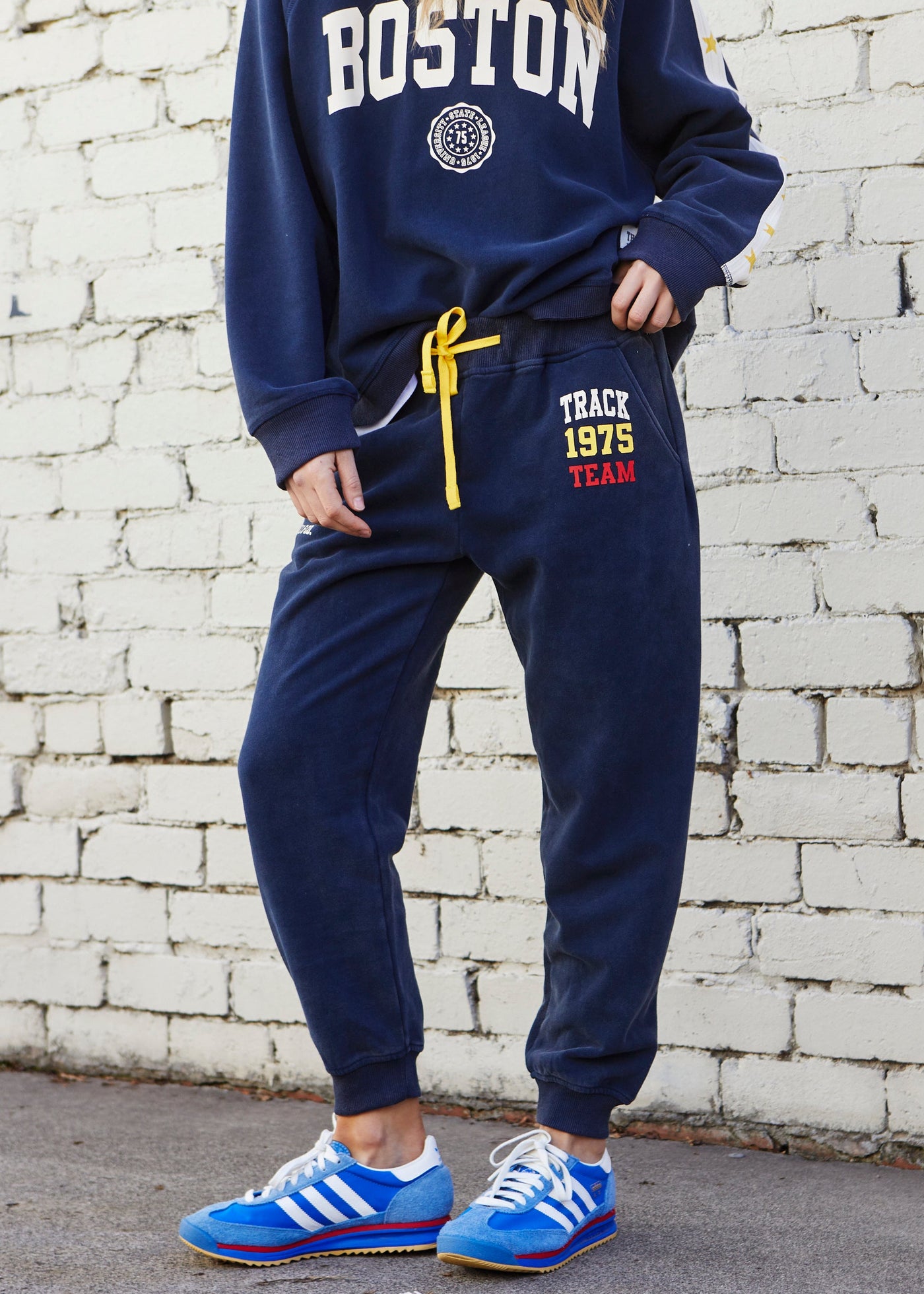 Hammill & Co College navy track pant in heavy stonewash fleece to give a well loved, worn-in look!