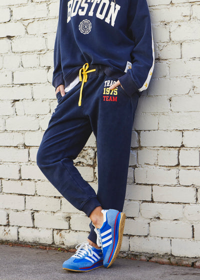 Hammill & Co College navy track pant in heavy stonewash fleece to give a well loved, worn-in look!