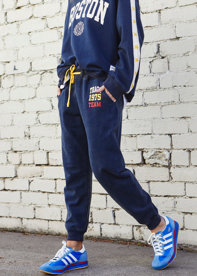 Hammill & Co College navy track pant in heavy stonewash fleece to give a well loved, worn-in look!