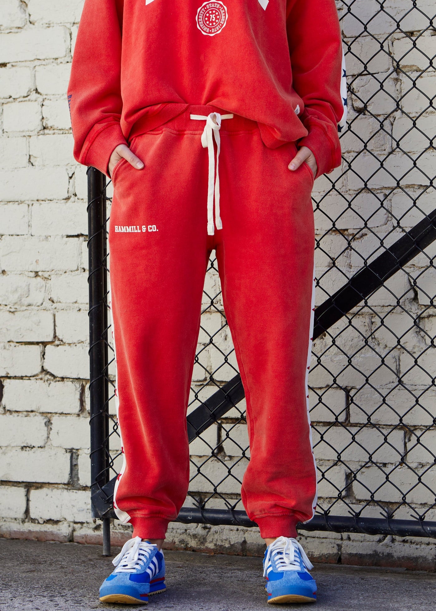 Hammill & Co New Retro track and field collection is here. College red track pant in a heavy stonewash fleece to give a well loved, worn-in look! 