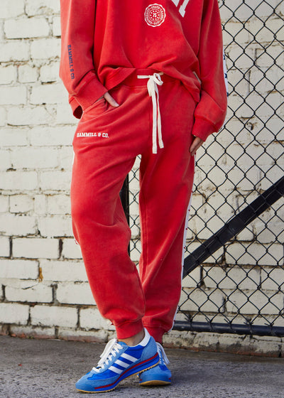 Hammill & Co New Retro track and field collection is here. College red track pant in a heavy stonewash fleece to give a well loved, worn-in look! 